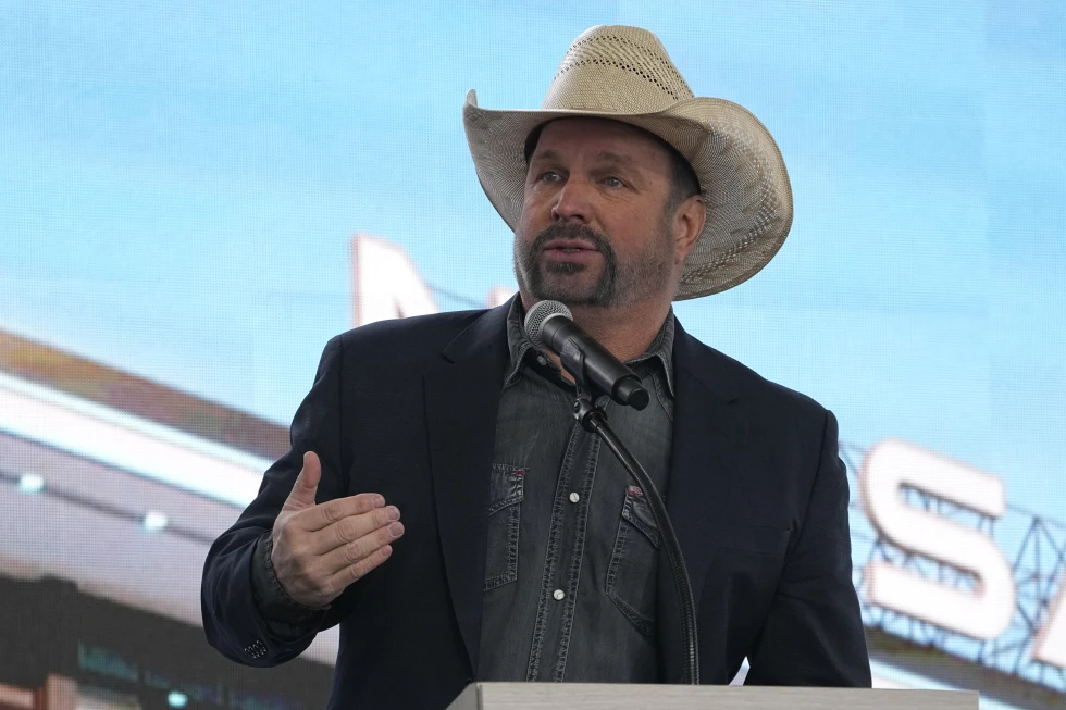 Garth Brooks speaks during a groundbreaking ceremony for the Tennessee Titans new NFL football stadium, Feb. 29, 2024, in Nashville, Tenn. (AP Photo/George Walker IV, File)